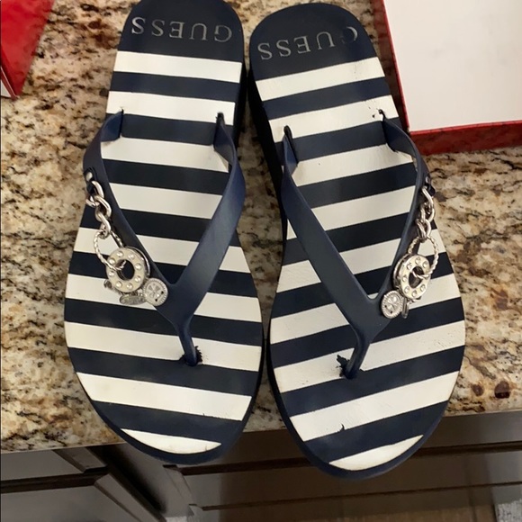 guess flip flops with charms